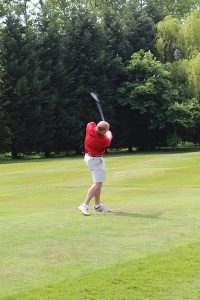 One of the Reservists teeing off