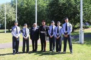 Air cadets pictured with veteran Burnett George Anderson and Sir John Peace