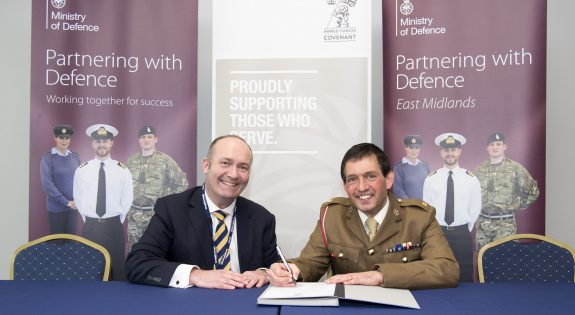 Chief Executive John Doherty and Major Robin Dutt sign the Armed Forces Covenant