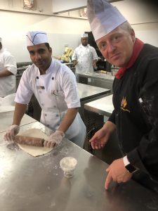 One of the Regiment training a Chef in Oman