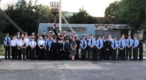 Sea Cadets and Royal Air Force Air Cadets assembled on the main deck of TS ORION