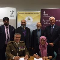 Representatives from Trent Education Centre and Westminster Centre for Research and Strategy sign the Armed Forces Covenant