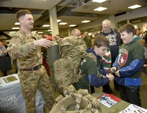 Reservist helps young fan.