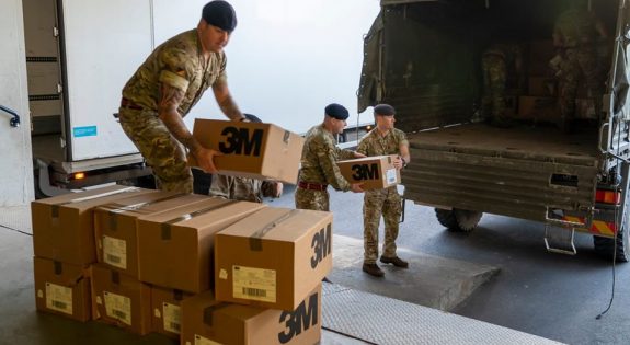 Army load truck with NHS supplies