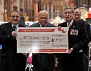 Representatives of Lincolnshire ACF with the Lord Lieutenant of Lincolnshire, holding an oversized cheque for ABF The Soldiers Charity
