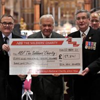 Representatives of Lincolnshire ACF with the Lord Lieutenant of Lincolnshire, holding an oversized cheque for ABF The Soldiers Charity
