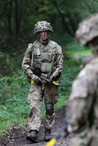 A soldier in uniform.