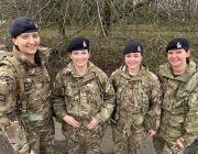 Four women in camouflage.
