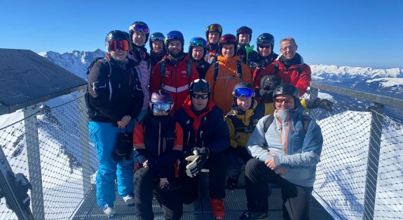 A group from the Royal Yeomanry stood together on a ski slope.