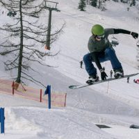 S snowboarded jumping.