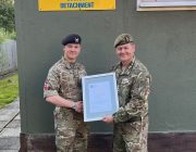 Cadet Staff Sergeant William Craft receiving his Commendation from Colonel Ian Sackree.