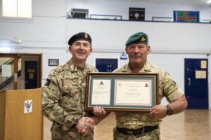 Col Stone VP presents Captain Bruce Saunderson with his Commendation