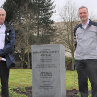 Kenneth Bannerman, of the Airfield Memorial Trust, and Tim Freeman, Deputy Managing Director of Toyota Motor Manufacturing (UK), stand next to the memorial.