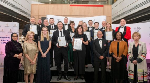 Group of East Midlands employers receiving Gold Employer Recognition Scheme Awards, pictured with special guest Louise Sandher-Jones, Minister for Veterans and People.